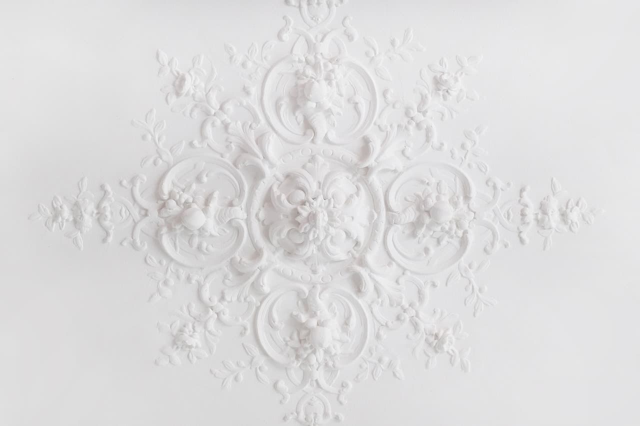 Ornate white plaster ceiling moulding